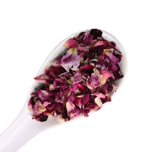 A spoon of dried rose petals
